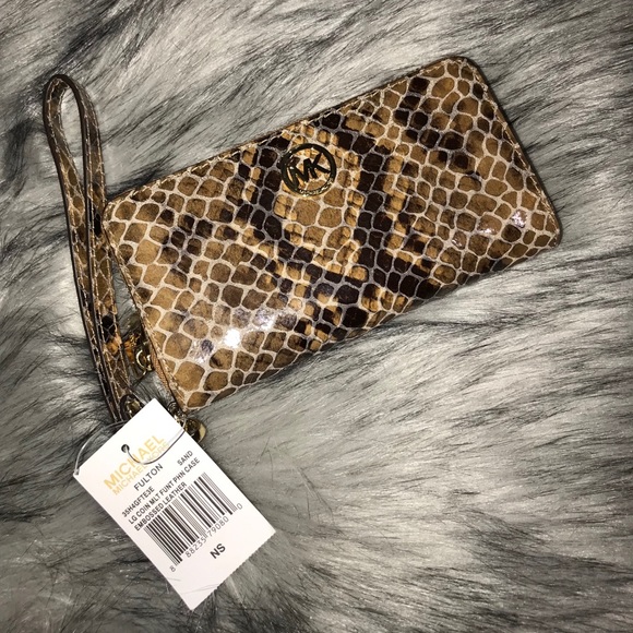 Michael Kors Handbags - Michael Kors snakeskin zip around wallet